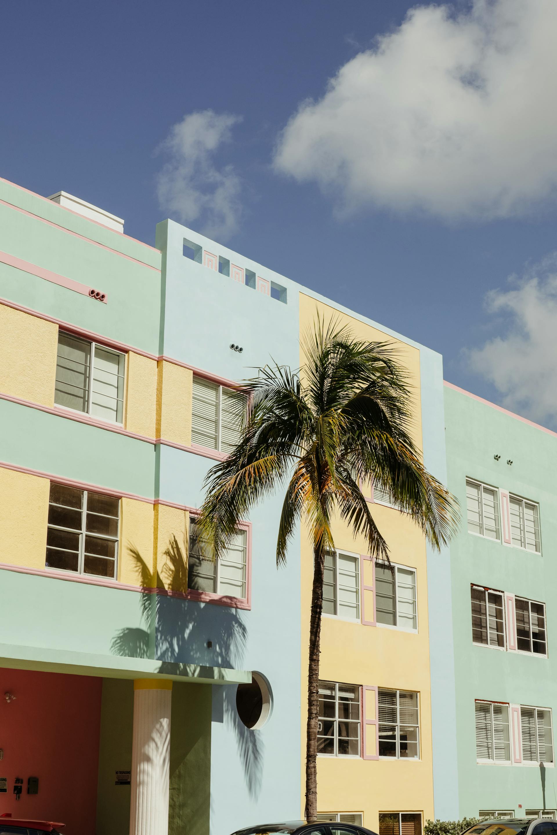 Colorful Art Deco hotel illuminated at night in South Beach